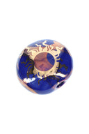 2-inch round ceramic smoke stone hand pipe in royal blue with 22-karat gold sun emblem.