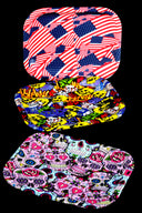 Small silicone rolling tray with flag collage and bold graphics, 8″ × 6″; curved rim helps corral papers and accessories.