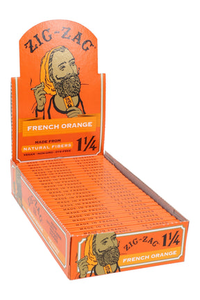Zig-Zag Orange 1¼ rolling papers display box with 24 orange packs shown open in countertop retail view