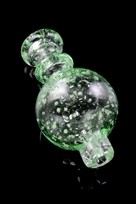 Green frit bubble carb cap with textured speckles and easy-grip handle; fits most buckets when matched to diameter.