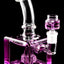 Purple fluid-filled cube bong angled view highlighting curved neck, square base, and included glass bowl on joint.