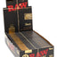 RAW Black 1¼ rolling papers 24-count display box in matte black and gold, featuring slim unbleached sheets and vegan acacia gum branding.