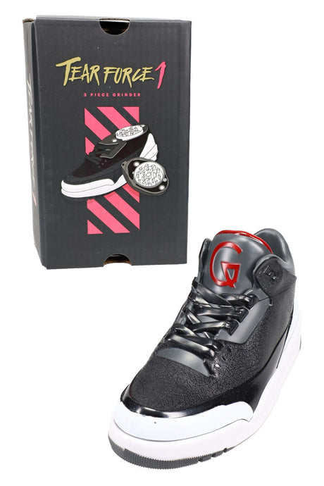 Black-and-silver “Tear Force 1” sneaker-shaped 40 mm herb grinder with retail box, angled display on white background.