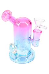 Pink and blue metallic glass mini bong, angled mouthpiece, 14 mm joint, and visible showerhead perc.