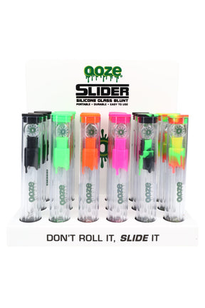 Ooze Slider silicone glass blunts 18-count display, countertop rack with assorted neon colors packaged in clear plastic tubes.
