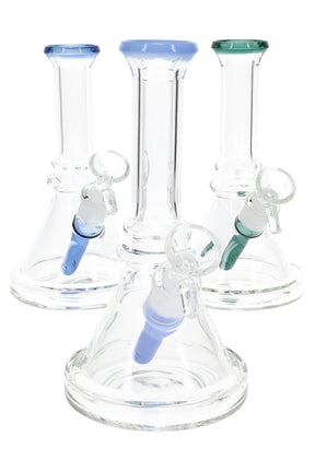 Three compact 7½ inch glass beaker bongs with blue and green accents plus 14.5 mm bowls