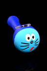 Blue silicone pipe with light-blue cat face cap and whisker details; glass bowl inset at the top.