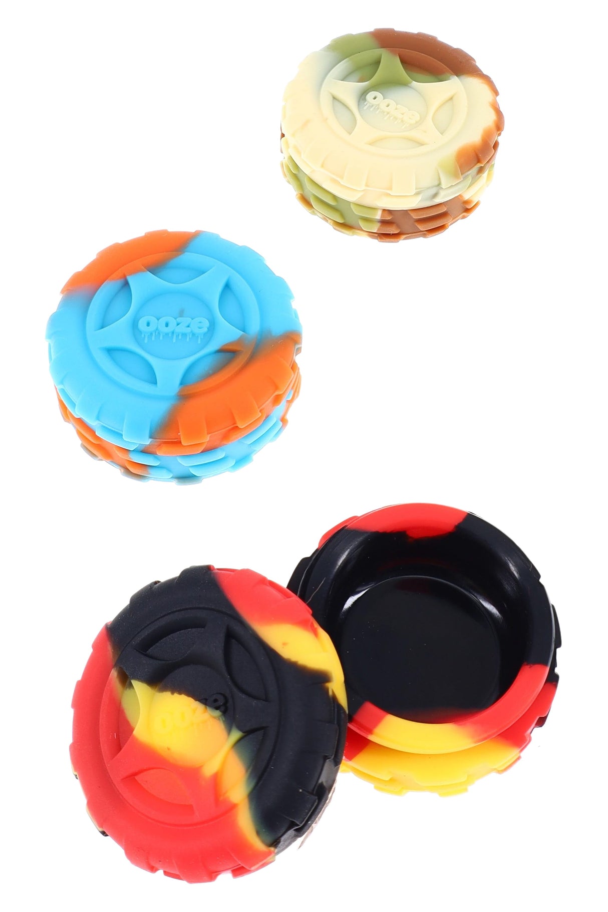 Stack of multicolor Ooze Hot Box 8-ml silicone containers, one opened to show glossy non-stick interior, perfect for organizing wax varieties