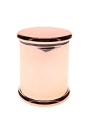 Front view of copper-tone XL glass storage jar showing seamless cylindrical body and flat lid on white backdrop