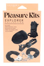 Black four-piece bondage kit featuring breathable ball gag, faux-fur handcuffs, 16.5-foot rope, and blindfold in retail box