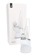Puffco New Peak Pro 3DXL in Pearl next to retail box, clear cone glass with laser-cut perc slots and joystick carb cap.
