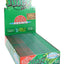 Juicy Jay’s Absinth 1¼ flavored rolling papers display box, green packaging with open tray of neatly lined booklets.