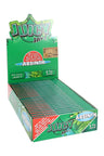 Juicy Jay’s Absinth 1¼ flavored rolling papers display box, green packaging with open tray of neatly lined booklets.