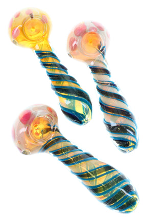 5″ thick fumed glass spoon with dichro swirl stripe, dotted bowl accents, and color-changing shine; shown in assorted colors.