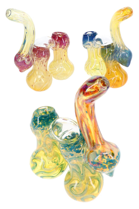 Multiple 7″ Sherlock glass bubblers with curved necks, double chambers, and colorful frit accents