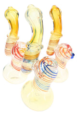 Assorted color-changing glass Sherlock bubblers with multicolor stripes, curved necks, and marble accents