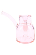 Petal pink 5″ NWTN Vesper glass bubbler with subtle tint and curved stem, minimalist mini bong design on white.