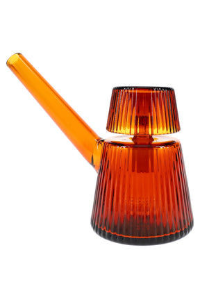 Amber 5″ NWTN Deco ribbed glass bubbler with tapered base and angled mouthpiece, Art Deco tabletop water-filtered pipe on white background.