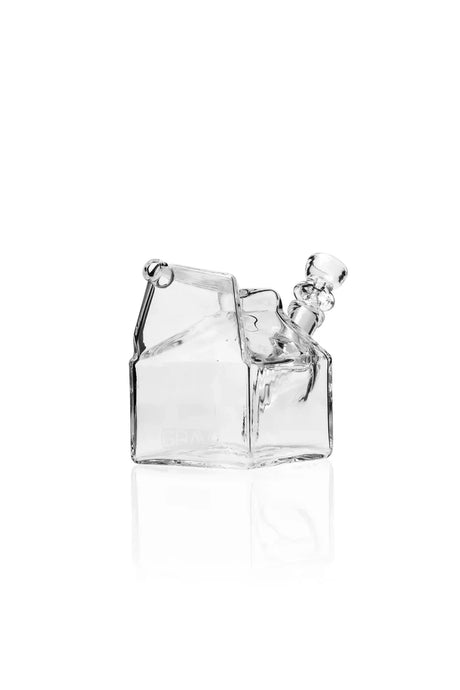 Angled view of the GRAV milk carton bubbler highlighting the open spout, clear square body, and removable bowl.