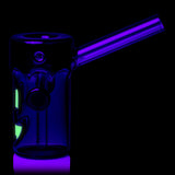 Side UV view of MJ Arsenal Frankenbubbler glass bubbler showing purple mouthpiece and glowing facial detail