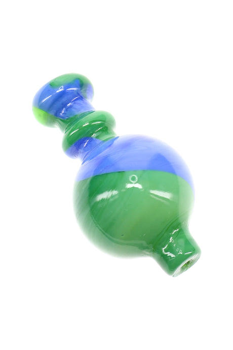 Closeup of green and blue swirl striped bubble carb cap showing rounded shape and tapered airflow opening for dab rigs.