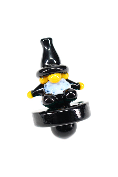 Colorful wizard character glass carb cap with black base, stands upright for airflow control on banger