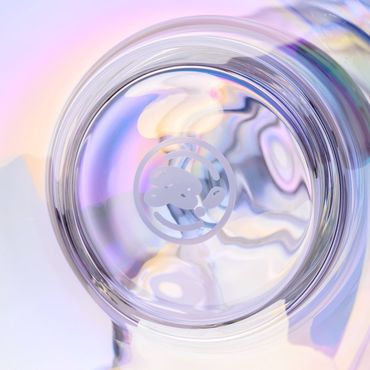Close-up of iridescent glass bong base with glossy electroplated finish and etched BigFun! bubble logo