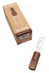 MJ Arsenal Ridge Chillum beside Alpine Collection box, clear glass taster with dark wood mouthpiece for dry herb.