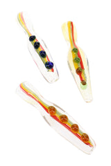 Three assorted 3″ glass chillums with rasta stripes, color-changing glass, and raised marble accents