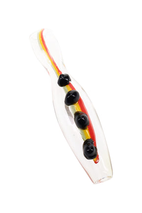 Close-up of 3″ rasta glass chillum with red, yellow, and green stripes plus colored marble grips