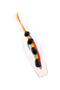Close-up of 3″ rasta glass chillum with red, yellow, and green stripes plus colored marble grips