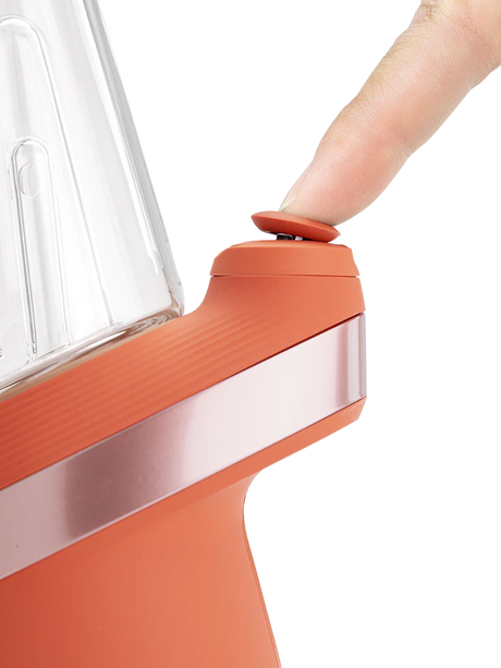 Closeup of the New Peak Canyon joystick carb cap being pressed, demonstrating directional airflow control.