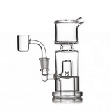 Rotating side view of clear mini dab rig with column chamber, angled neck, and 10 mm quartz banger attached