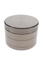 Closed silver metal herb grinder with textured grip bands and large 2.5 inch zinc alloy body