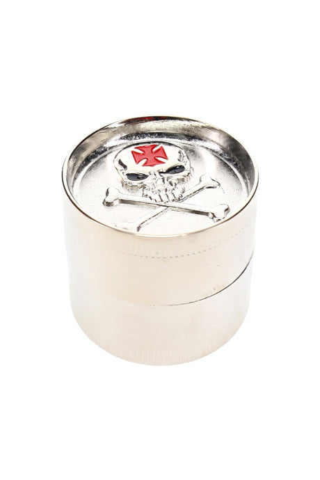 Closed 1½″ 3-part metal herb grinder with assorted decorative exterior design and compact round body
