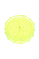 Neon yellow acrylic magnetic 2-piece grinder showing clear chamber and uniform peg teeth.