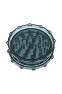 Smoke gray acrylic 2-piece magnetic grinder with visible teeth and rounded grip nubs.