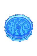 Blue acrylic 2-piece magnetic grinder featuring sturdy peg teeth and easy-grip rim.