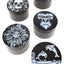 Five black aluminum 4-part herb grinders with assorted white decal lids—skull, leaf pattern, sun face, gorilla, dolphins.
