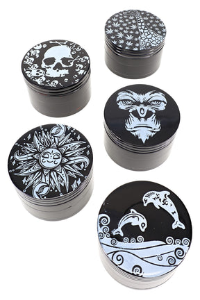 Five black aluminum 4-part herb grinders with assorted white decal lids—skull, leaf pattern, sun face, gorilla, dolphins.
