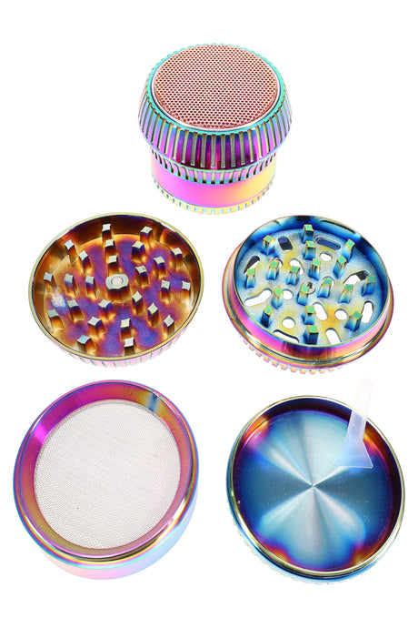 Iridescent rainbow 4-part metal herb grinder with textured cap, diamond teeth, fine mesh screen, and kief scraper, 63 mm size.