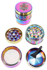 Rainbow 4-part metal herb grinder by Ninja Glass, 1½″ size with mesh kief screen and scraper, components shown disassembled on white.