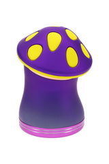 Purple and yellow mushroom metal herb grinder shown assembled, compact 2¼″ 4-part design with smooth ergonomic cap and metallic finish.