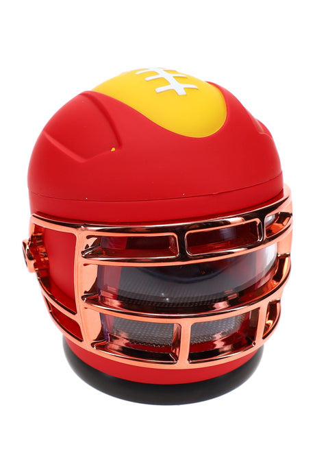Red and yellow football player metal herb grinder assembled, compact 2¼″ 4-part design with glossy faceguard and viewing window.