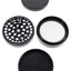 Black Cali Crusher O.G. grinder disassembled into 4 parts with precision teeth, fine mesh kief screen, and scraper.