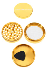 Gold Cali Crusher O.G. metal herb grinder apart, highlighting 4-piece build, mesh screen, and deep catch tray.
