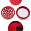 Red Cali Crusher O.G. 4-piece metal grinder opened to show uniform teeth and included pollen scraper.