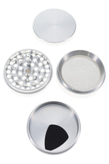 Silver Cali Crusher O.G. grinder in four parts with fine mesh screen and roomy kief catcher displayed.