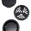 Black GRAV 3-piece grinder opened to show precision teeth plate and deep storage dish with magnetic lid.