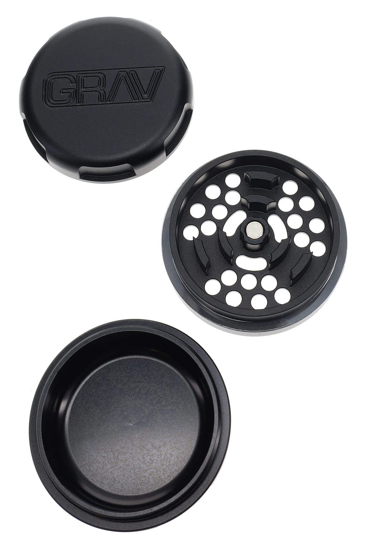 Black GRAV 3-piece grinder opened to show precision teeth plate and deep storage dish with magnetic lid.